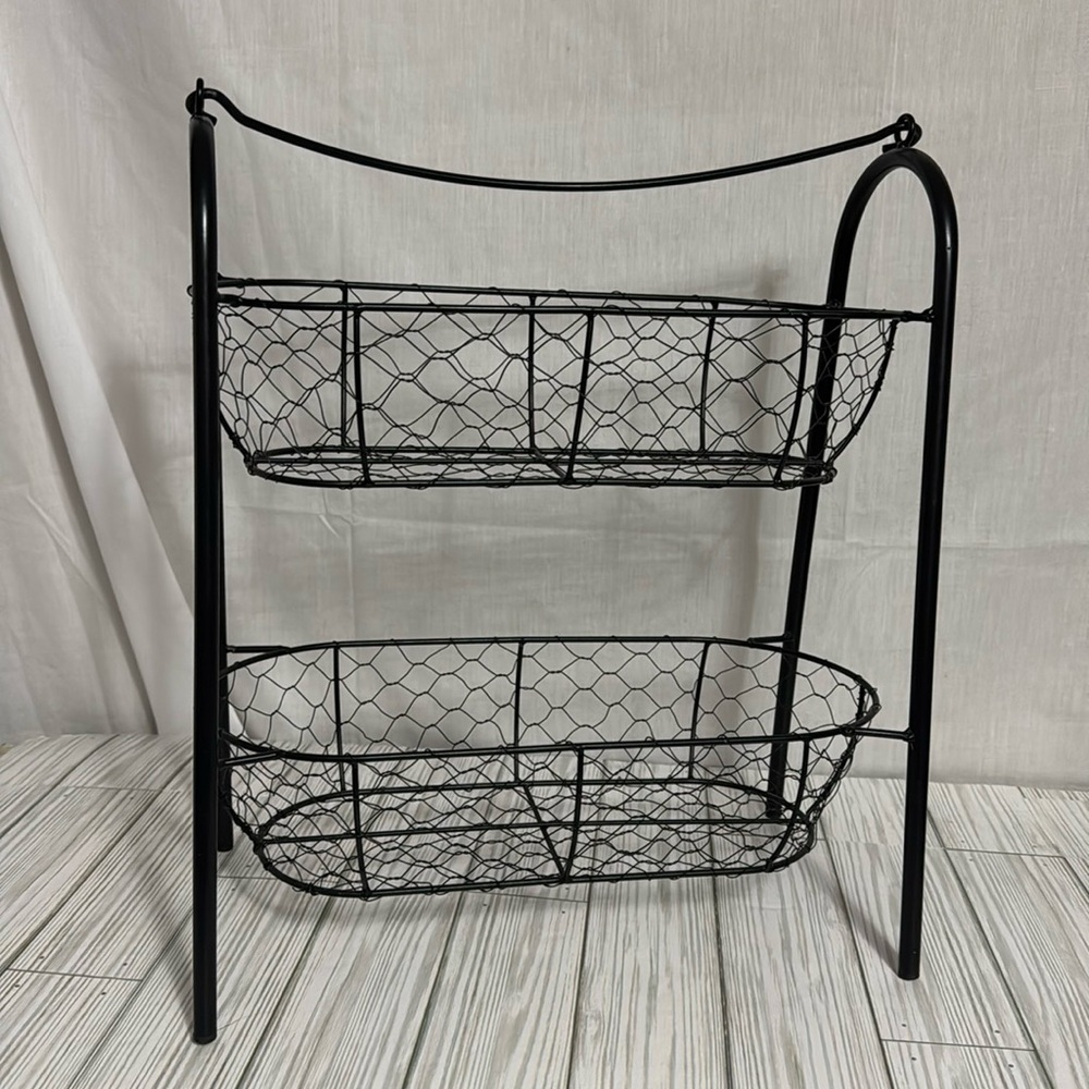 Two-tier metal basket.